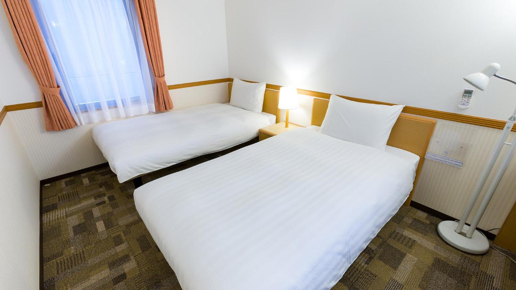 Toyoko Inn Tsushima Izuhara Habitación foto